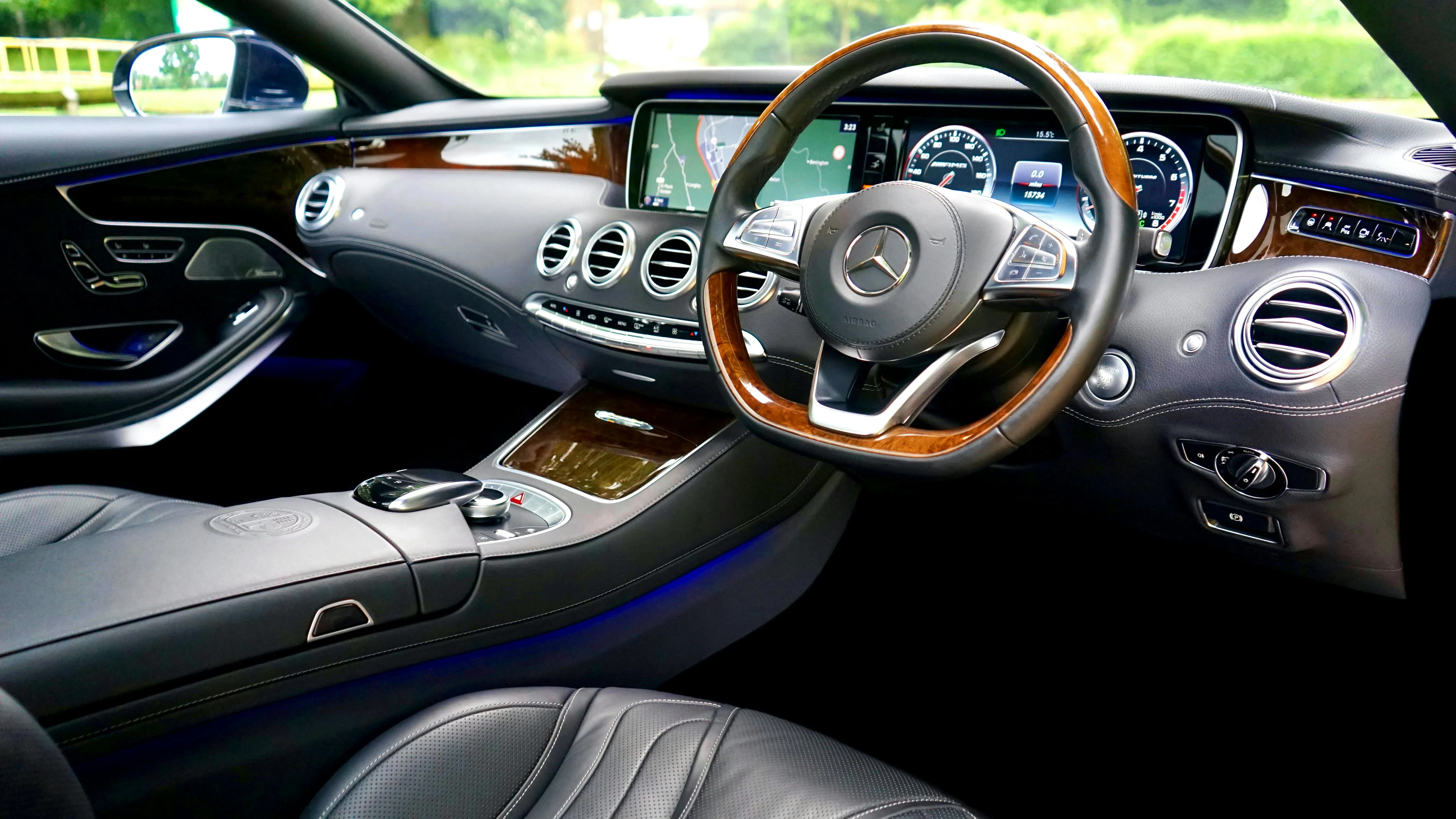 Interior photo of a Mercedes Benz car's driver seat