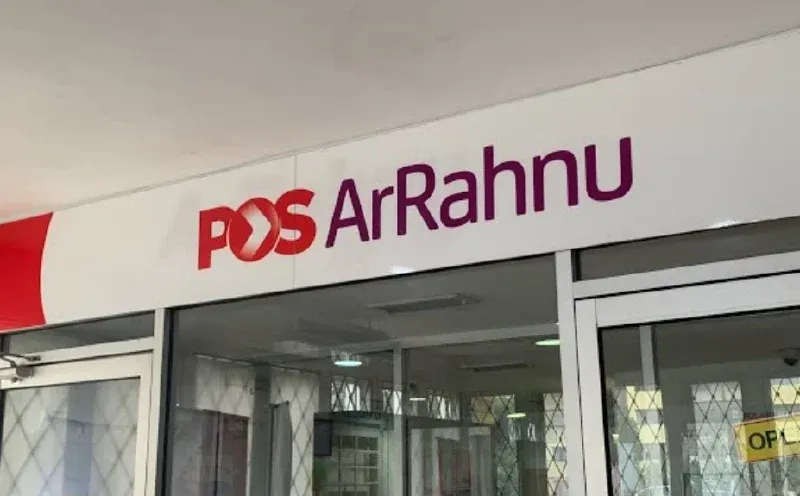 A Pos ArRahnu outlet storefront inside a Malaysian post office