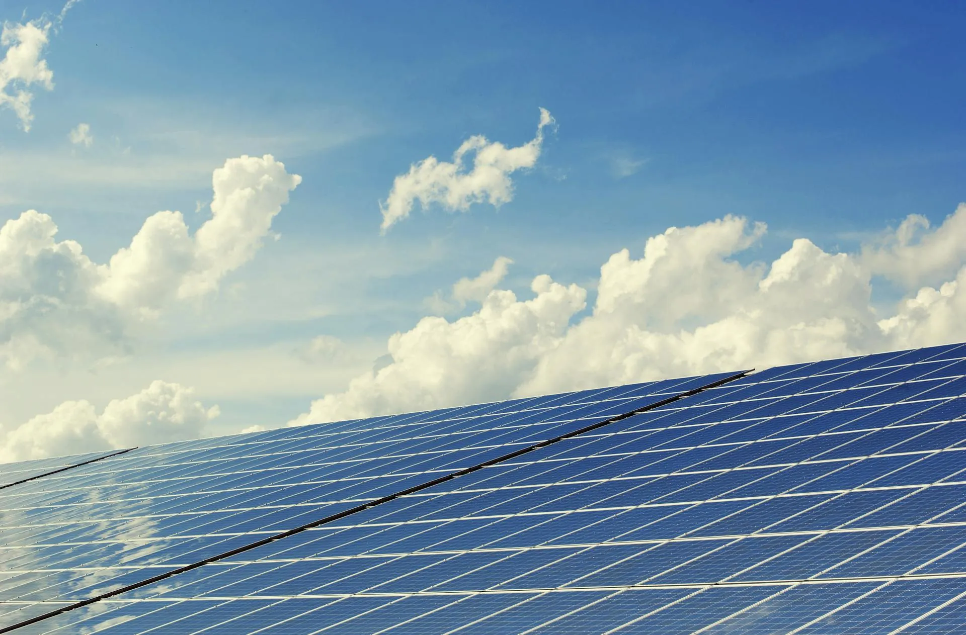 Large volume of solar panels facing the sky during daytime